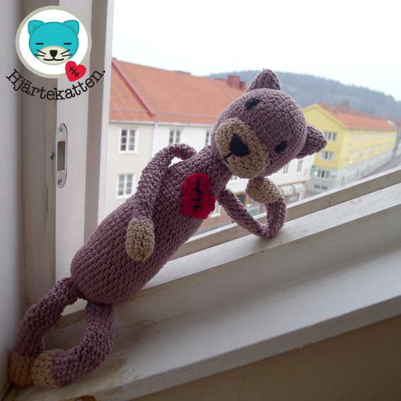 En hj&auml;rtekatt redo att tr&ouml;sta